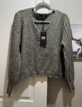 Sweaters & Knits image