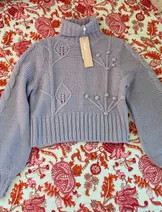 Sweaters & Knits image