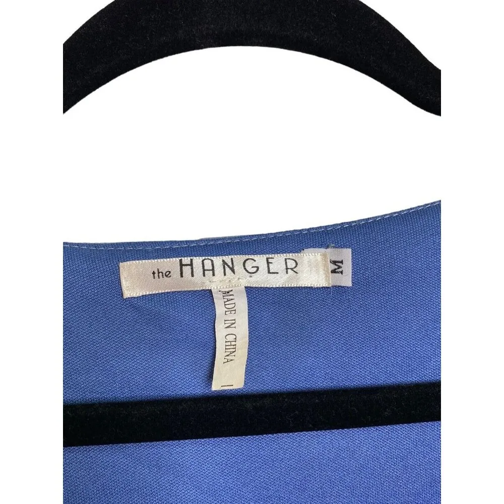 The Hanger Floral Romper Size Medium Baby Blue Long Sleeve Pockets Floral Shorts - Image 2