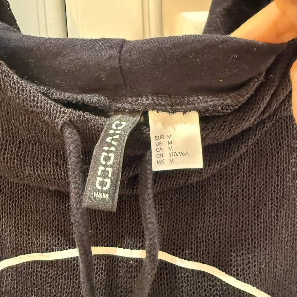 Black ‘Love & Hope’ See Through Hooded Jumper
Size M - Image 5