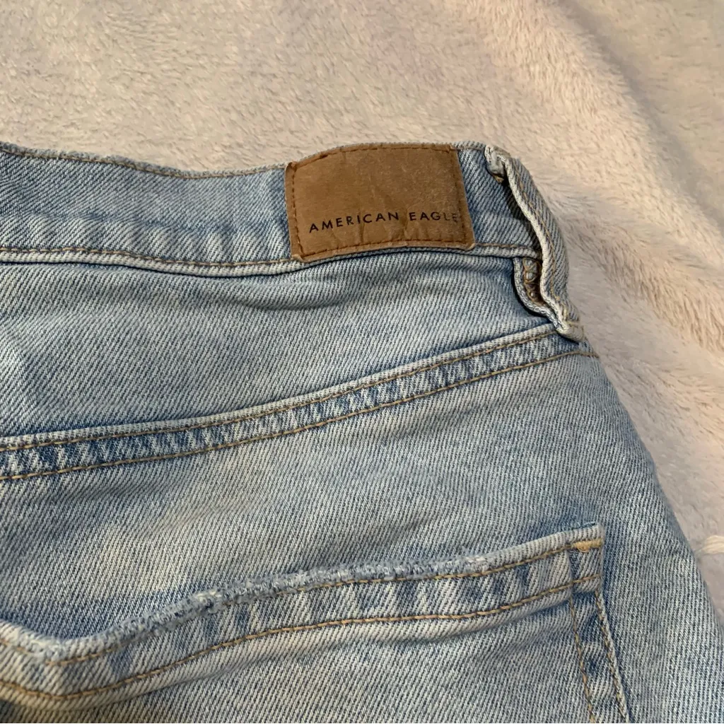 American Eagle Outfitters women's size 12 L Light Blue Distressed Jean Shorts - Image 8