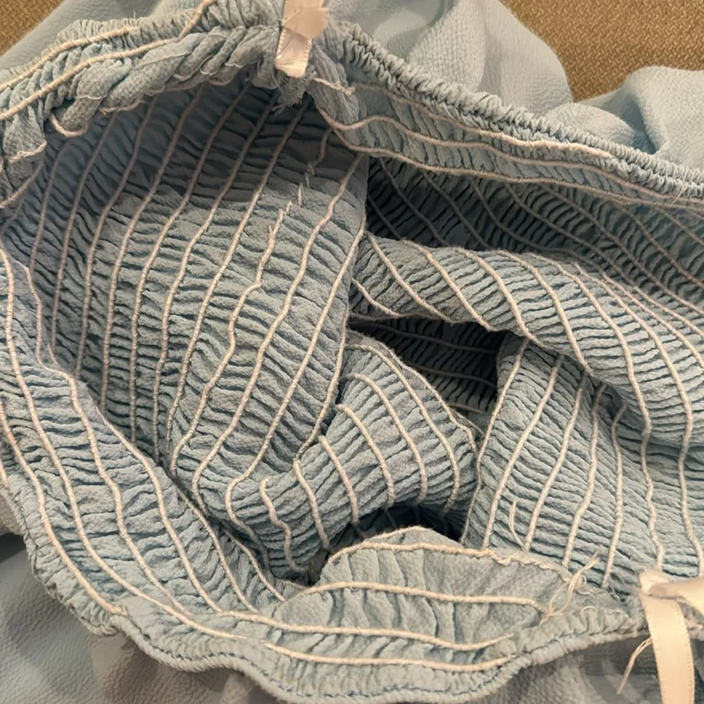 Blue romper with overlying skirt - Image 5