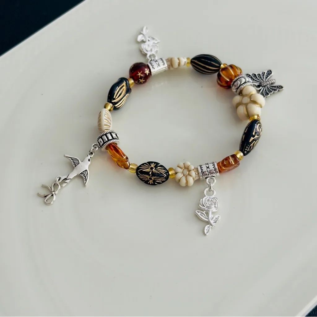Elegant Silver and Brown Beaded Bracelet - Image 2