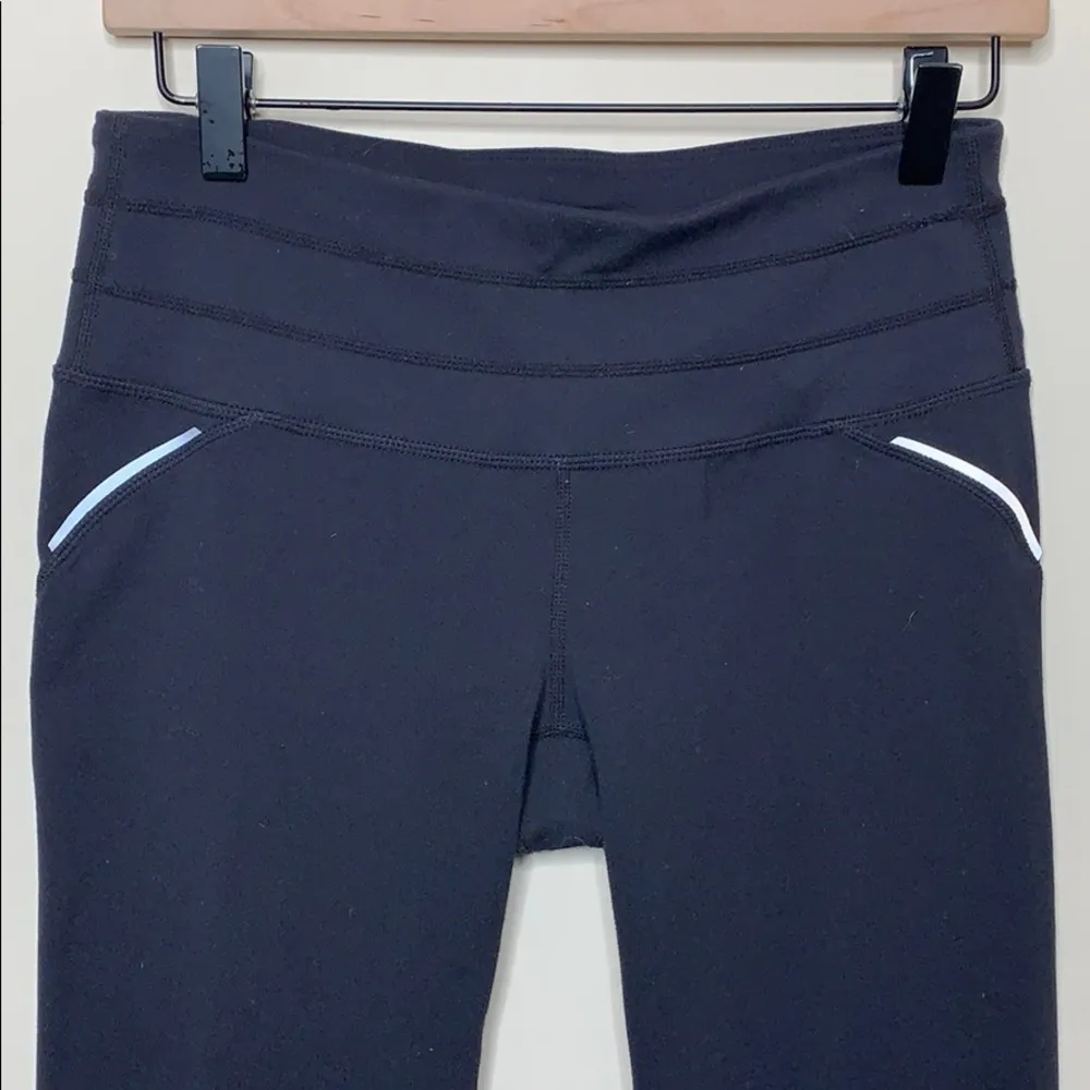 Athleta  • relay capri legging with reflective detail - Image 77