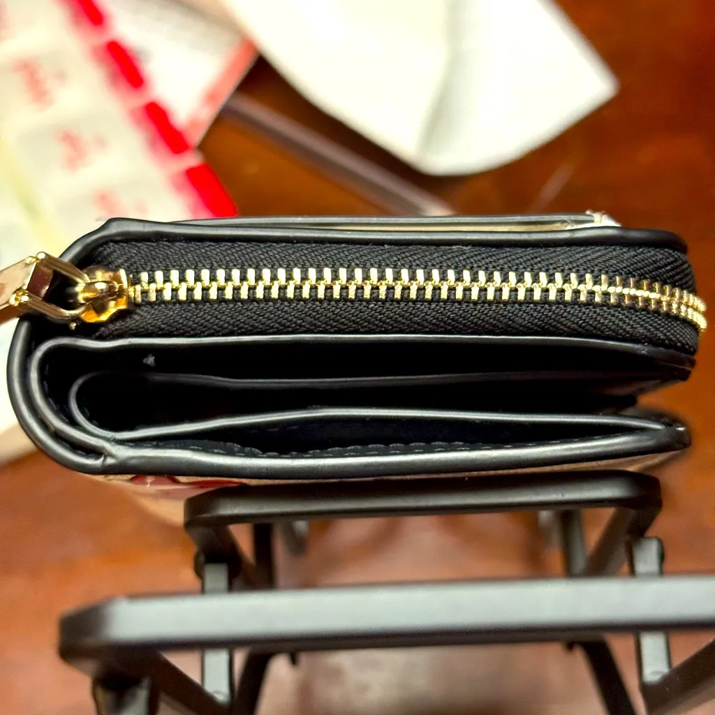 Disney X Kate Spade New York Minnie
Mouse Zip Around Wallet - Image 14