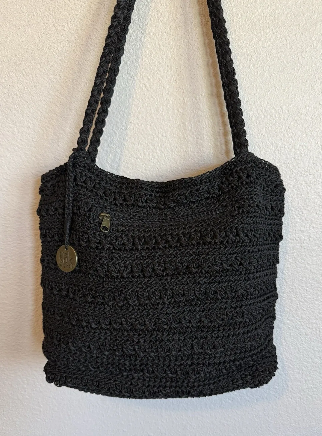 The Sak Black Crochet Woven Women's Shoulder Bag Purse Zip Closure Bag Charm - Image 1
