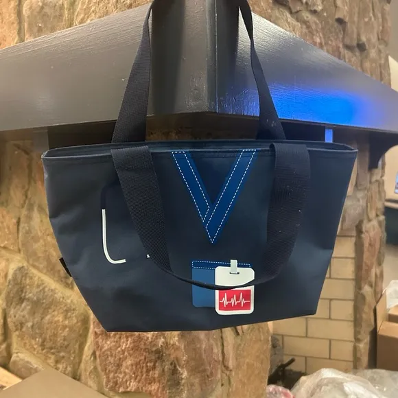 Nurse pattern Dark Blue Tote Bag with Bright Accents and Sturdy Fabric - Image 1