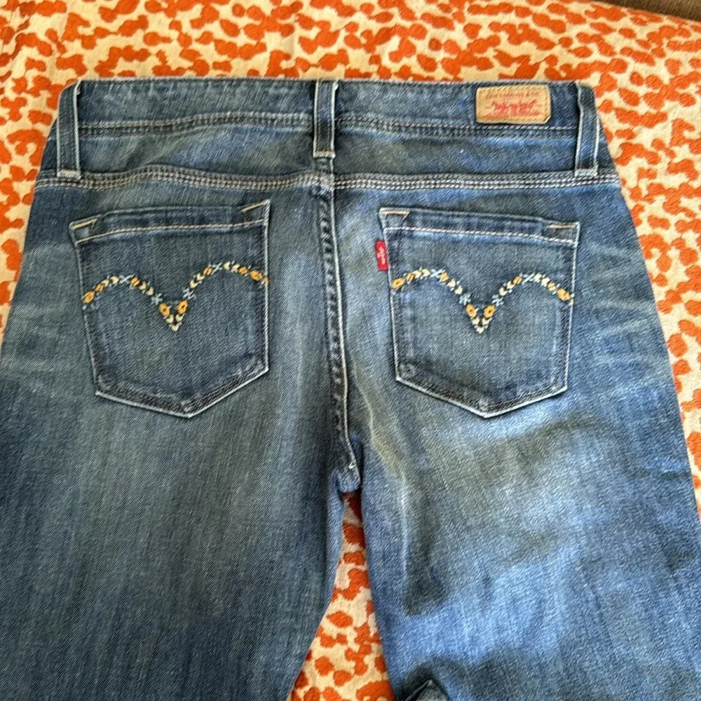 Levi’s flare ultra low rose stretch floral pocket size 5 M NWT rare find - Image 7