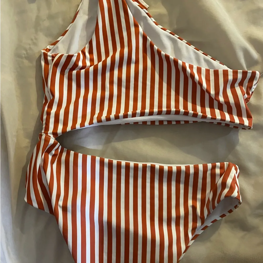 Women’s orange and white vertical striped cut out monokini/one piece swimsuit - Image 4