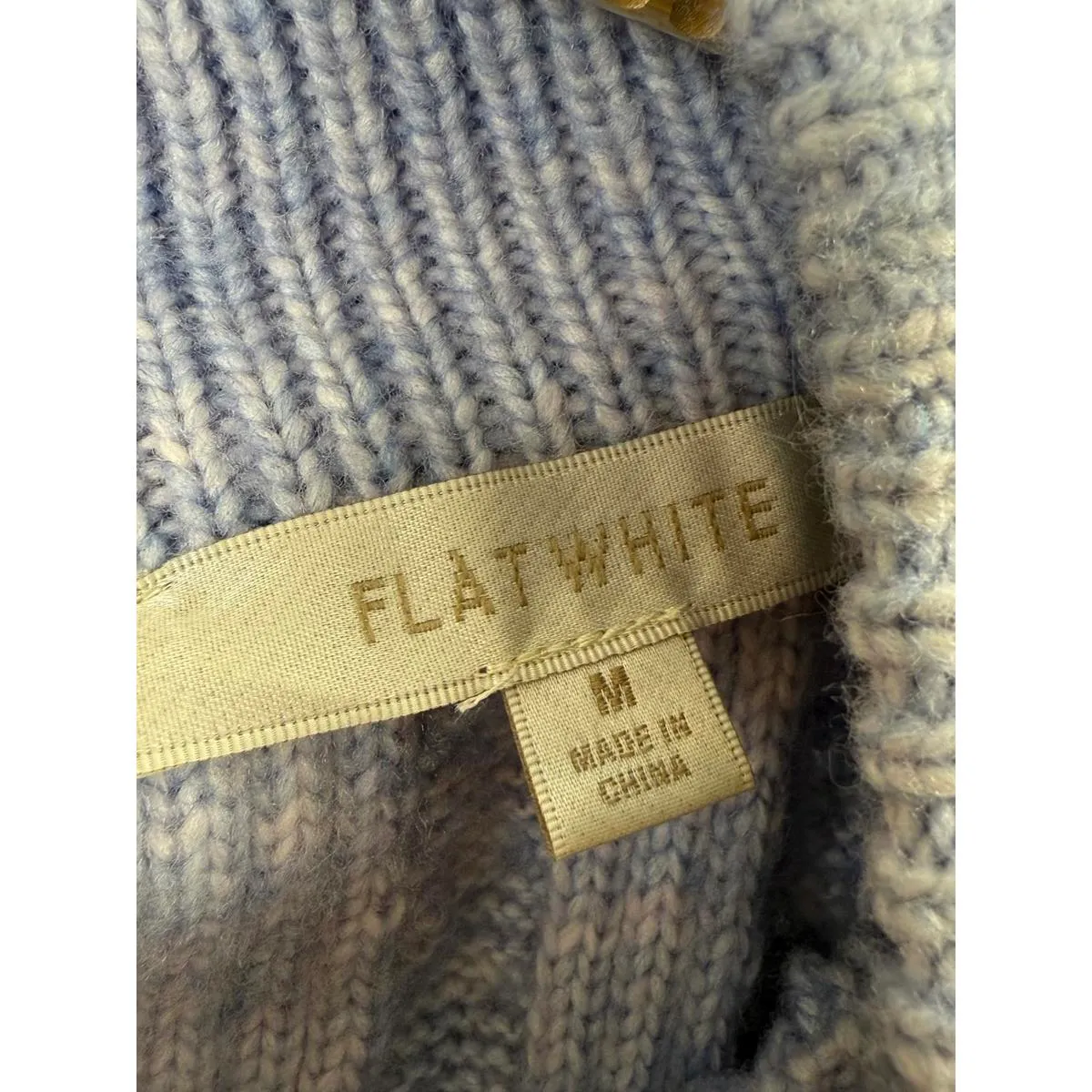 Flat White Light Blue Knit Sweater with Back Ribbon Tie Detail - Image 4
