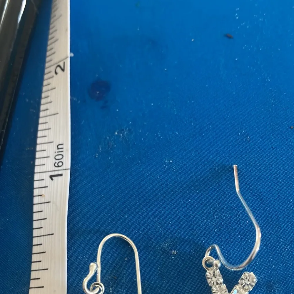 Elegant Silver Starburst Earrings - Image 2