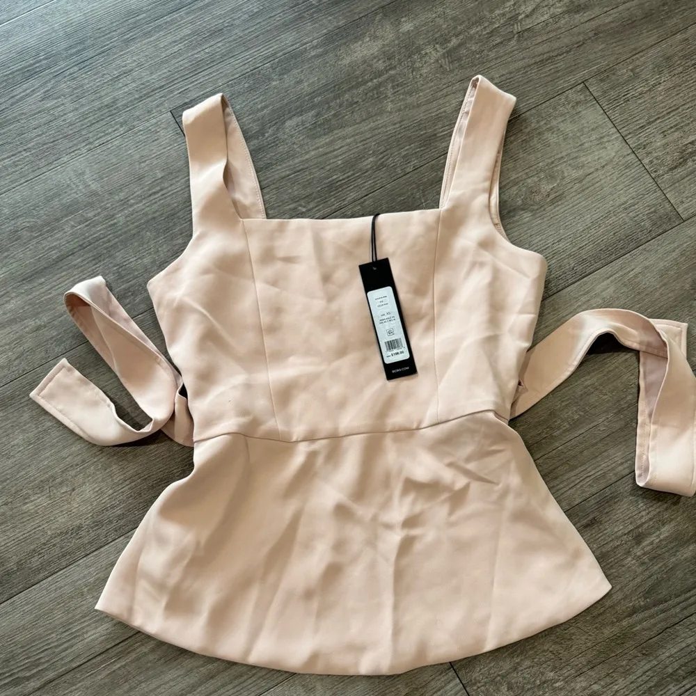 BCBGmaxazria fit and flare tie front back slit peplum top 🤍 - Image 6