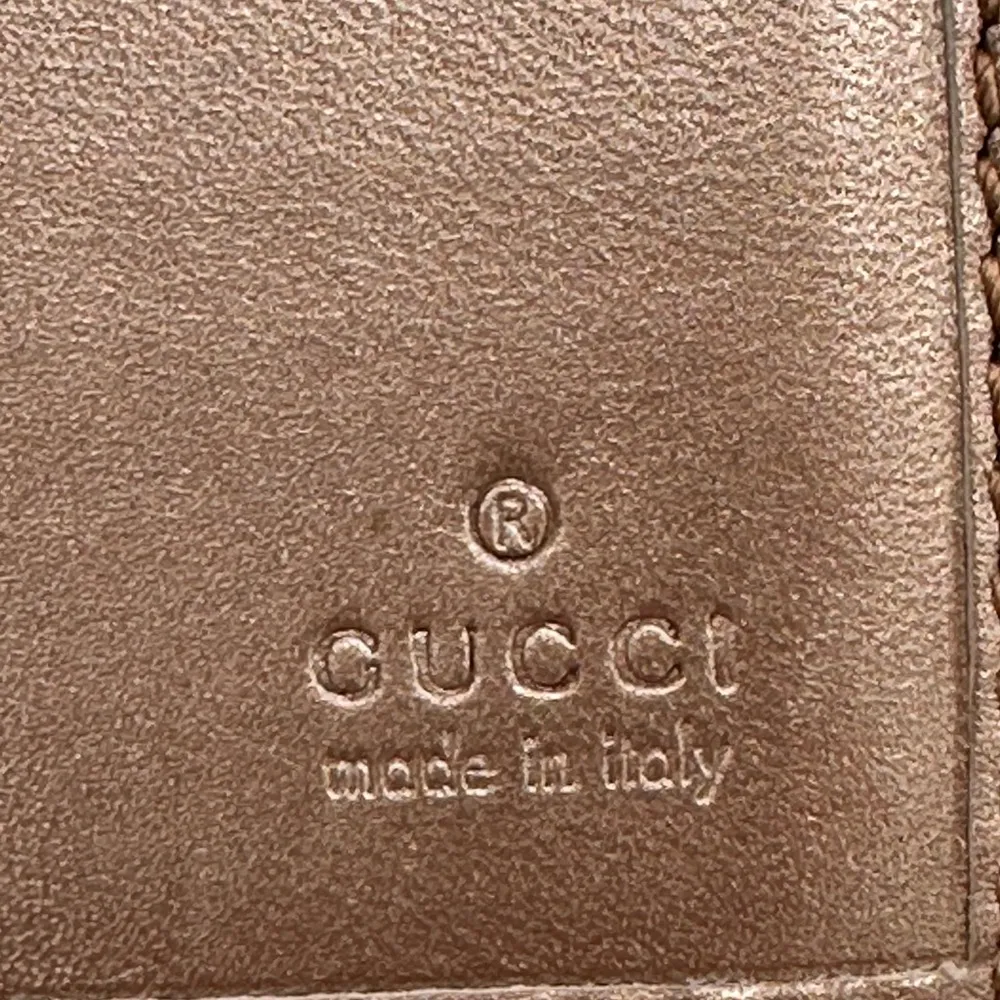 GUCCI
Metallic Guccissima Continental
Wallet Pink - Image 6