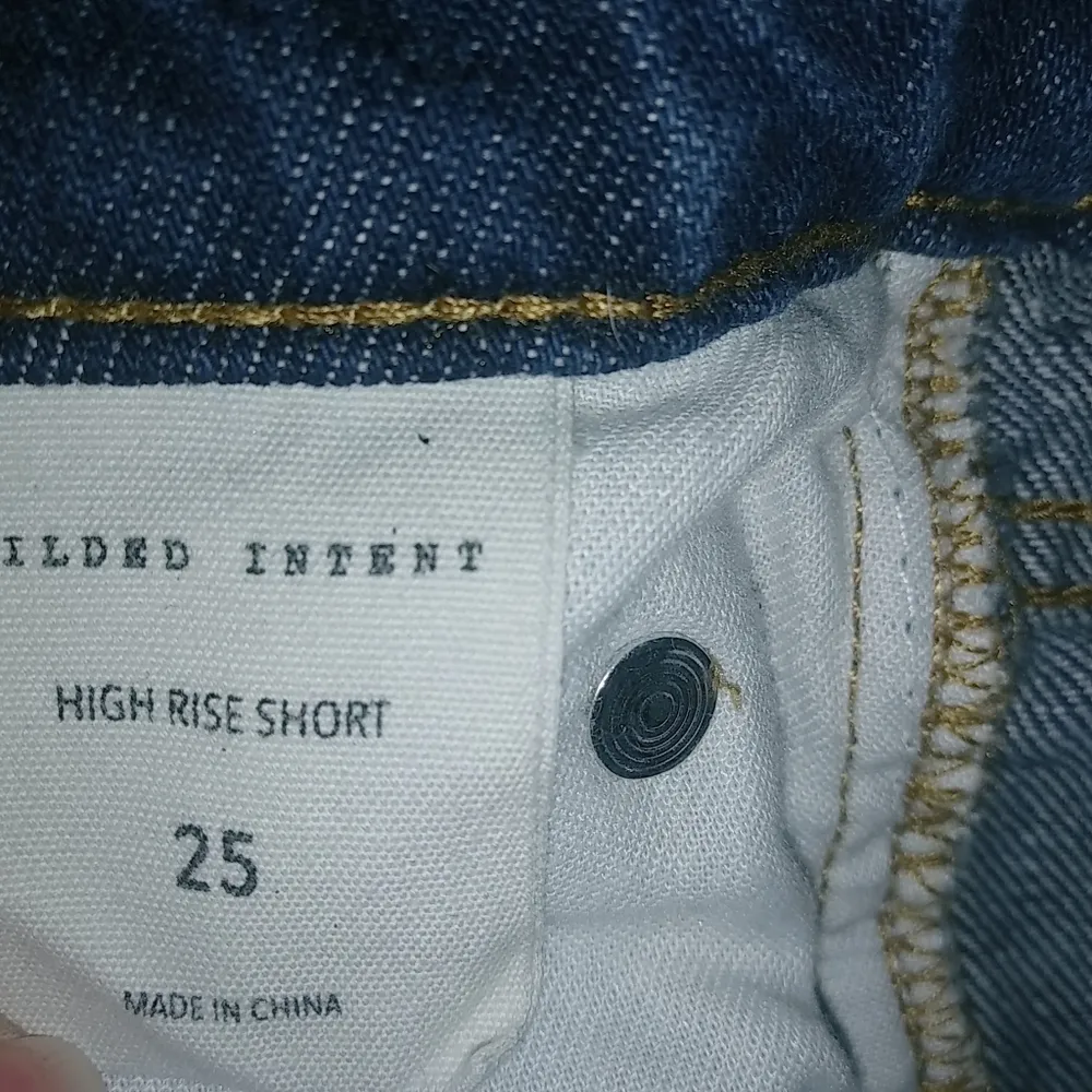 Gilded Intent 25 High Rise Distressed Dark Wash Raw Hem Jeans Shorts - Image 3