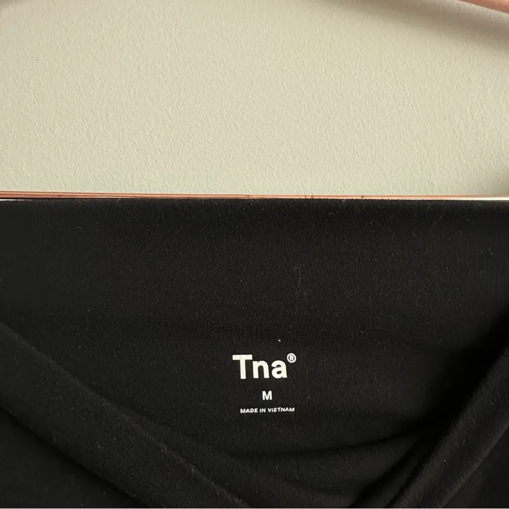 Aritzia butter black flare legging split hem - Image 3