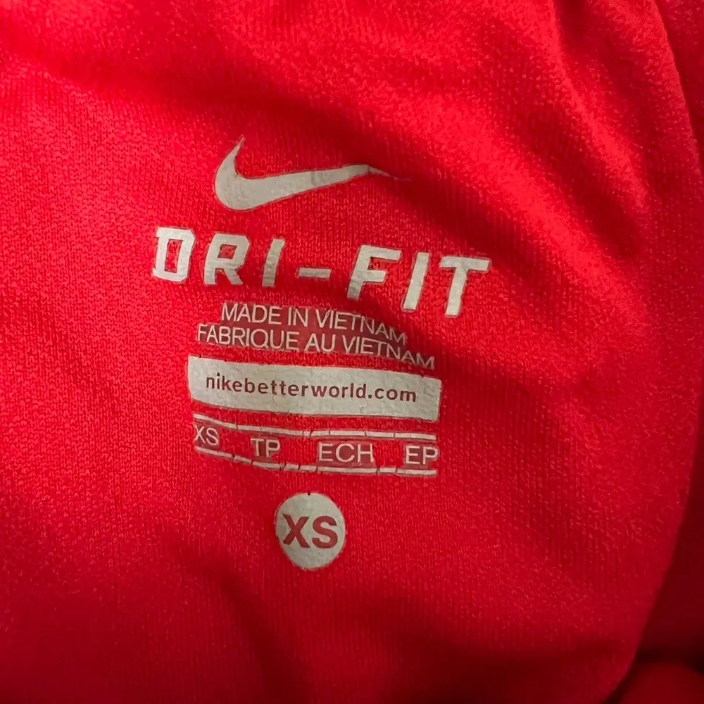 Nike red and white running shorts with embroidered logo - Image 4
