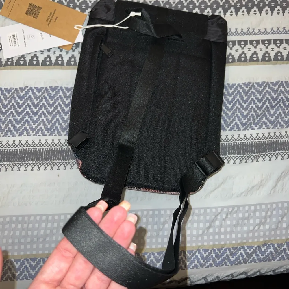 Herschel Retreat Sling bag NWT
Black winter plaid - Image 5