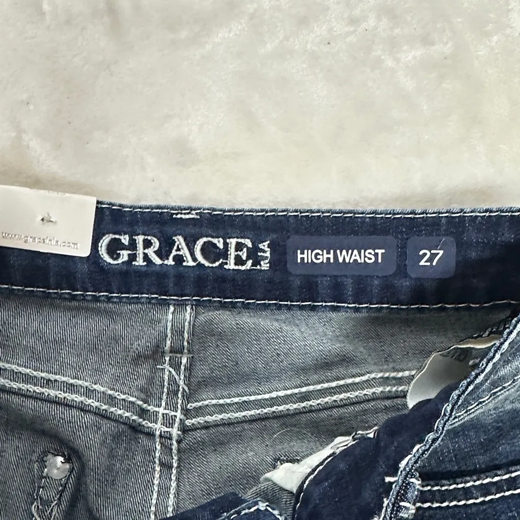 Grace Dark Blue Flare Jeans with Patterned Hem and Leg Size 27 - Image 10