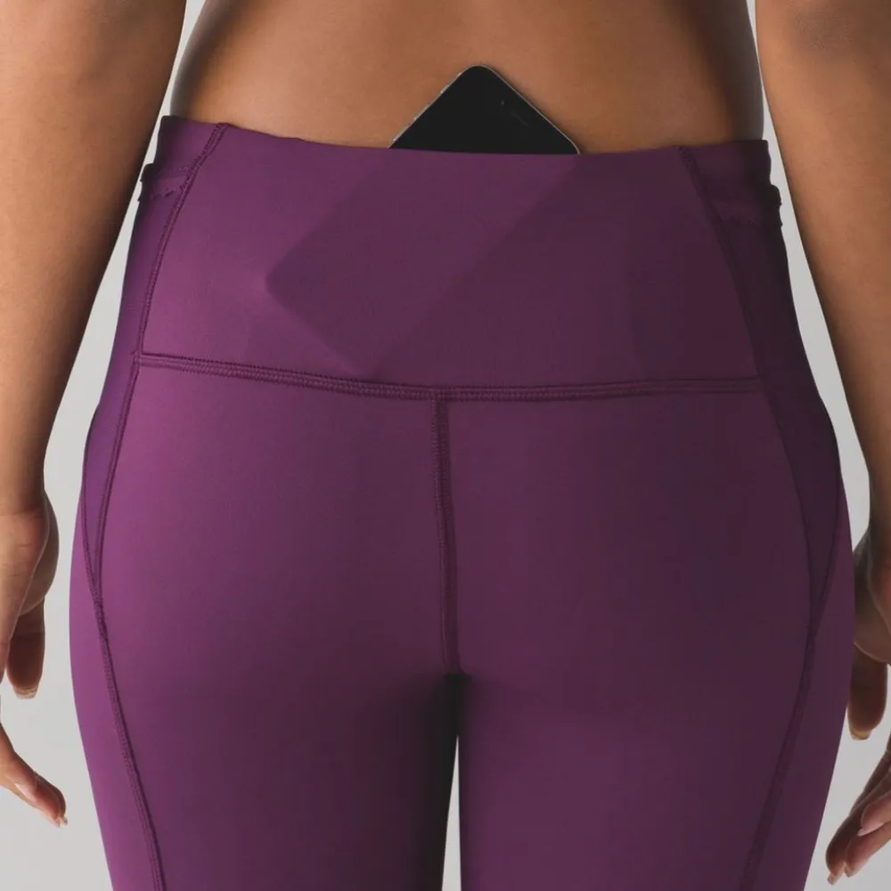 Lululemon Free Runner Crop. Size 6. EUC. In Plum. - Image 5