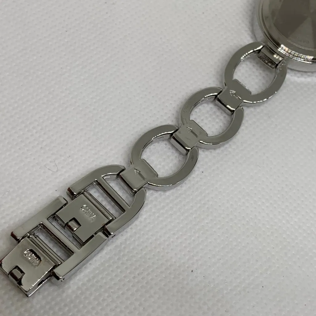 Ellen Tracy women watch silver tone rhinestones 28mm round up to 7.5” running - Image 9