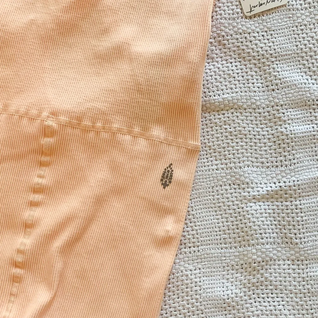 Free People Movement Peach Ribbed onesie M/L Orange Size undefined - Image 2