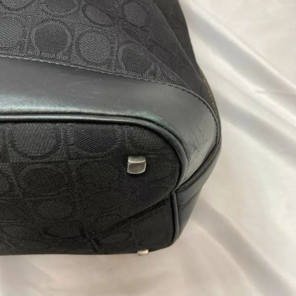 Salvatore Ferragamo Black Monogram Hobo Bag with Curved Design - Image 11