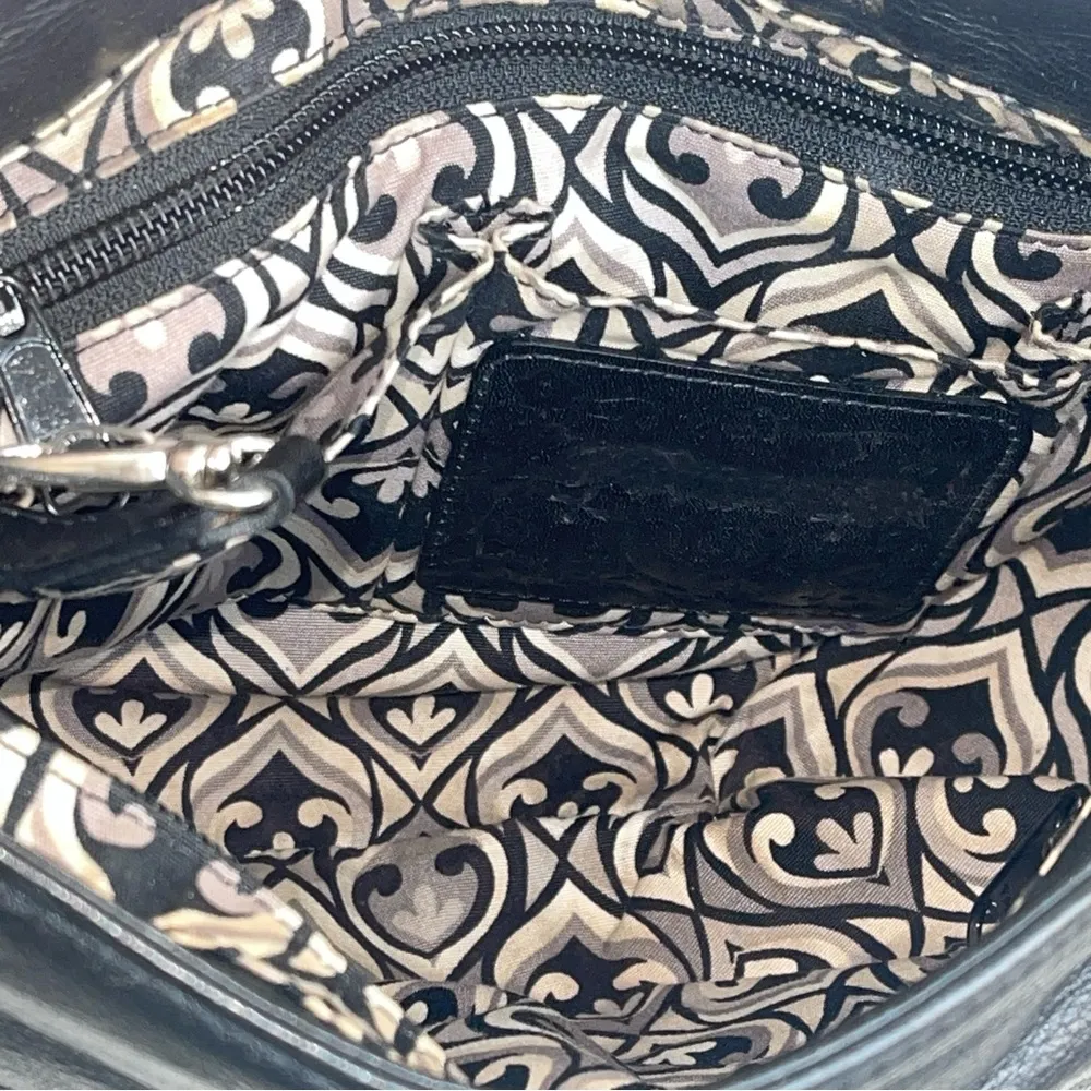 BRIGHTON black leather cross body bag with silver accents and chains and tassels - Image 9