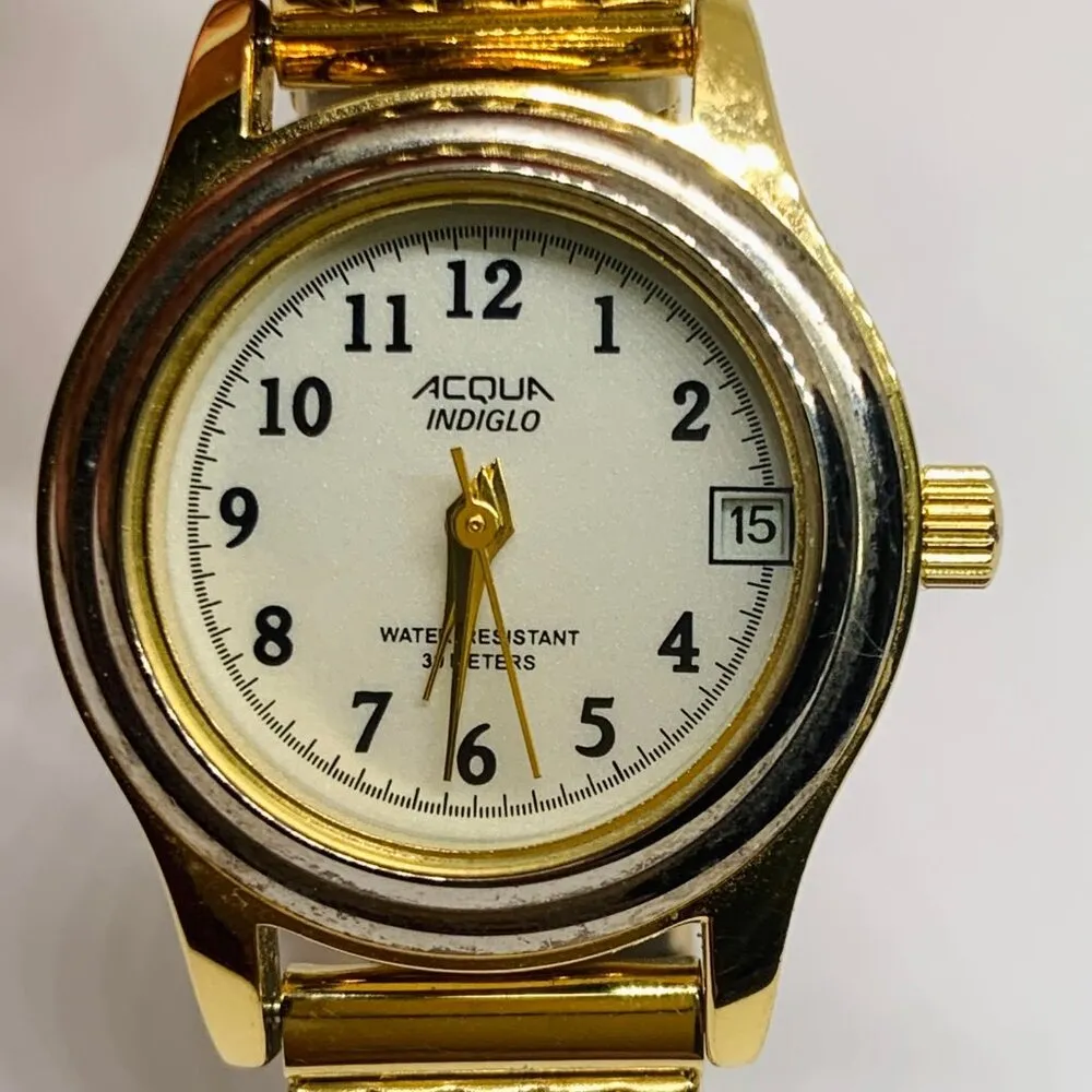Acqua indiglo women’s quartz analog date watch 25mm gold tone watch running - Image 2
