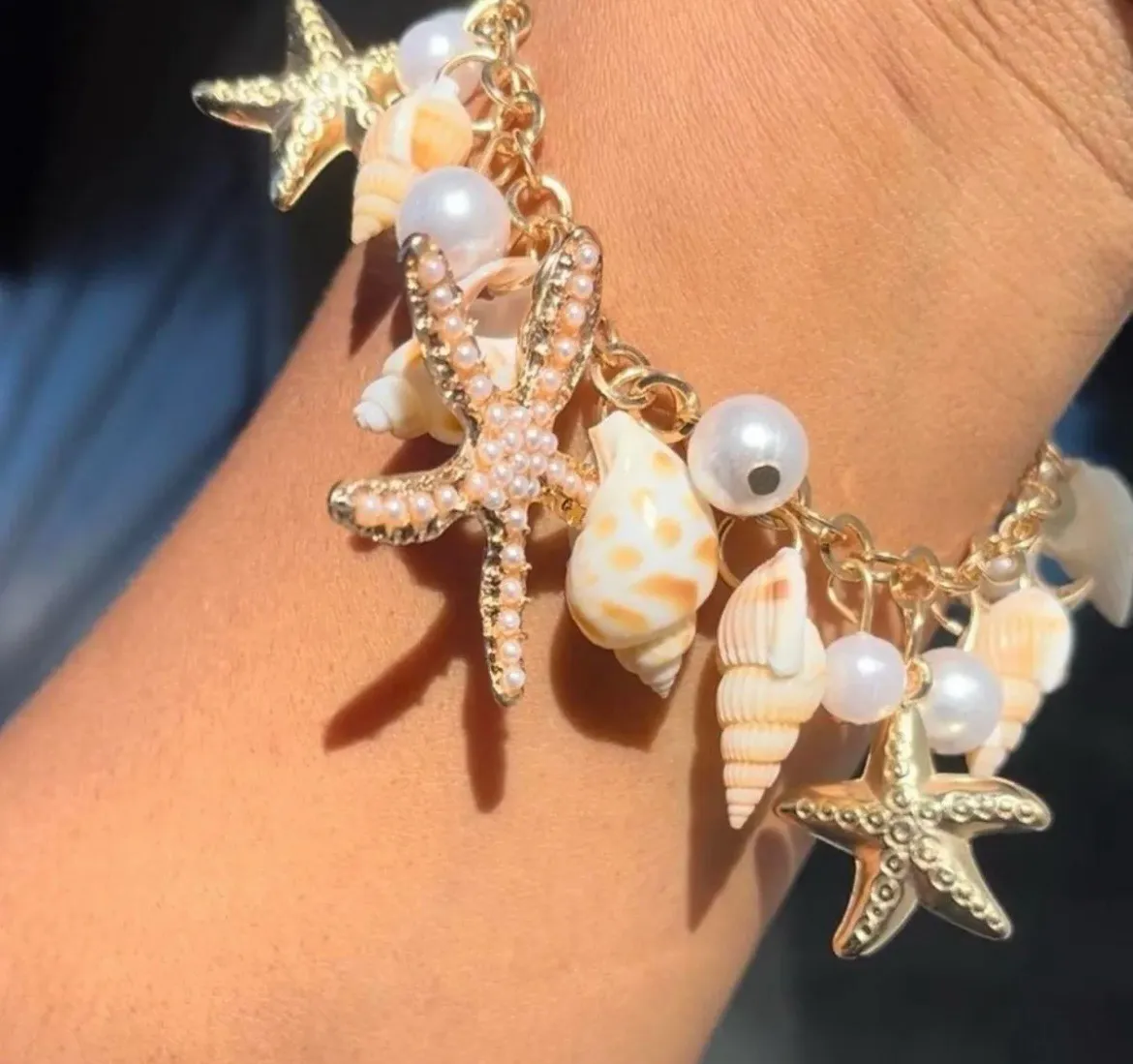 Gold and White Charm Bracelet With Start Fish and Seashell Bracelet. - Image 2
