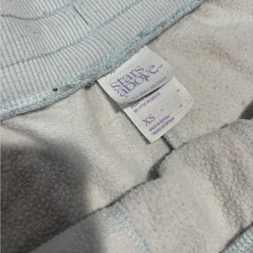 Stars above blue tie dye xsmall shorts - Image 4