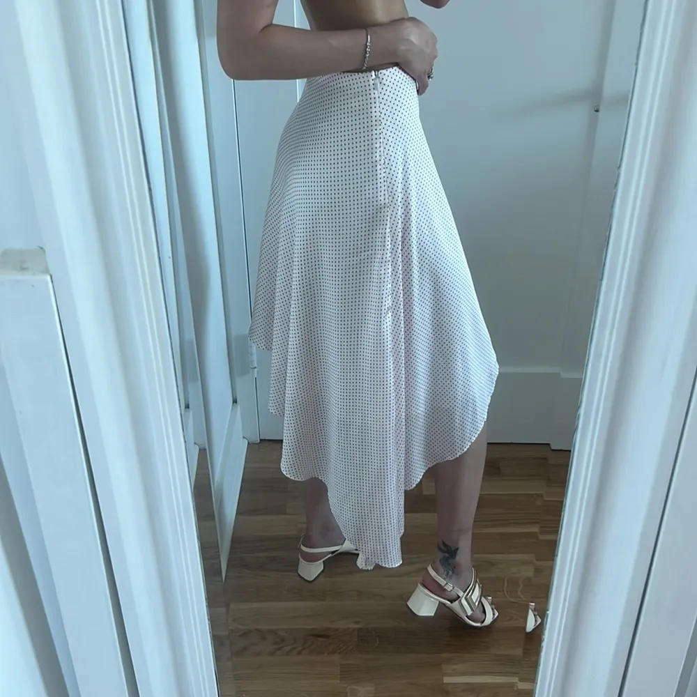 Alexis white polka dot satin asymmetrical skirt - Image 11