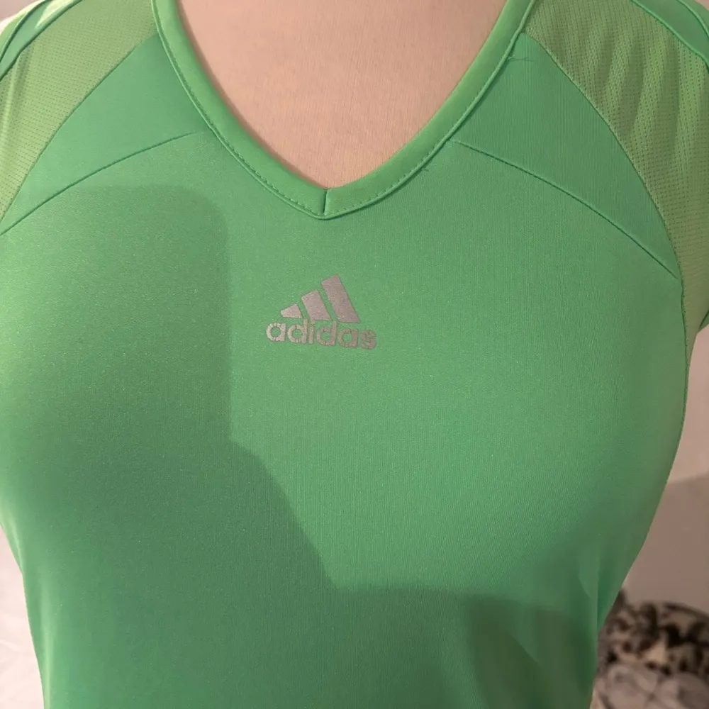 Adidas Women's Neon Green Sleeveless Sporty Top with grey adidas logo size S - Image 5
