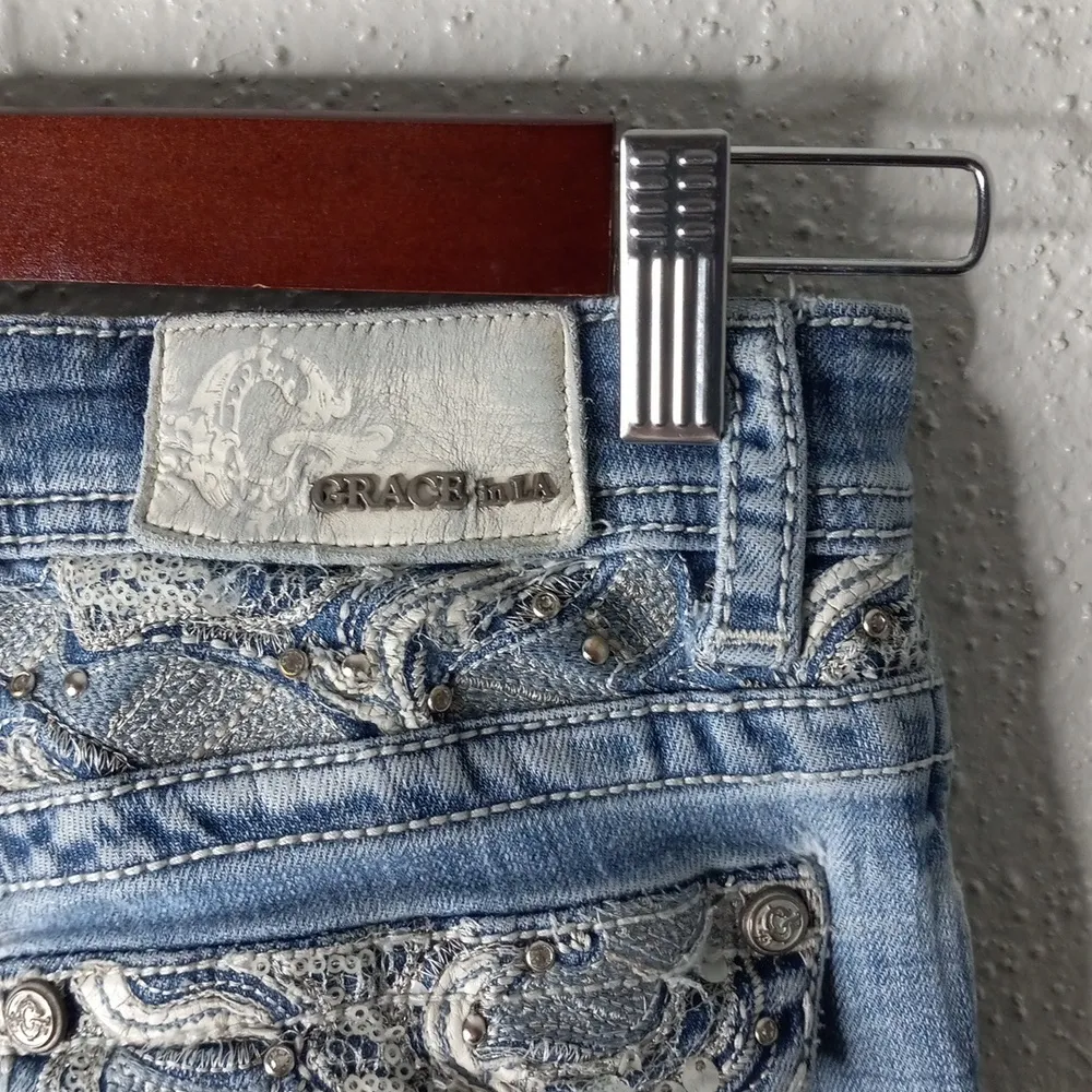 Grace in L.A. 26x32 Distressed Rivet Flap Pocket Light Wash Jeans - Image 6