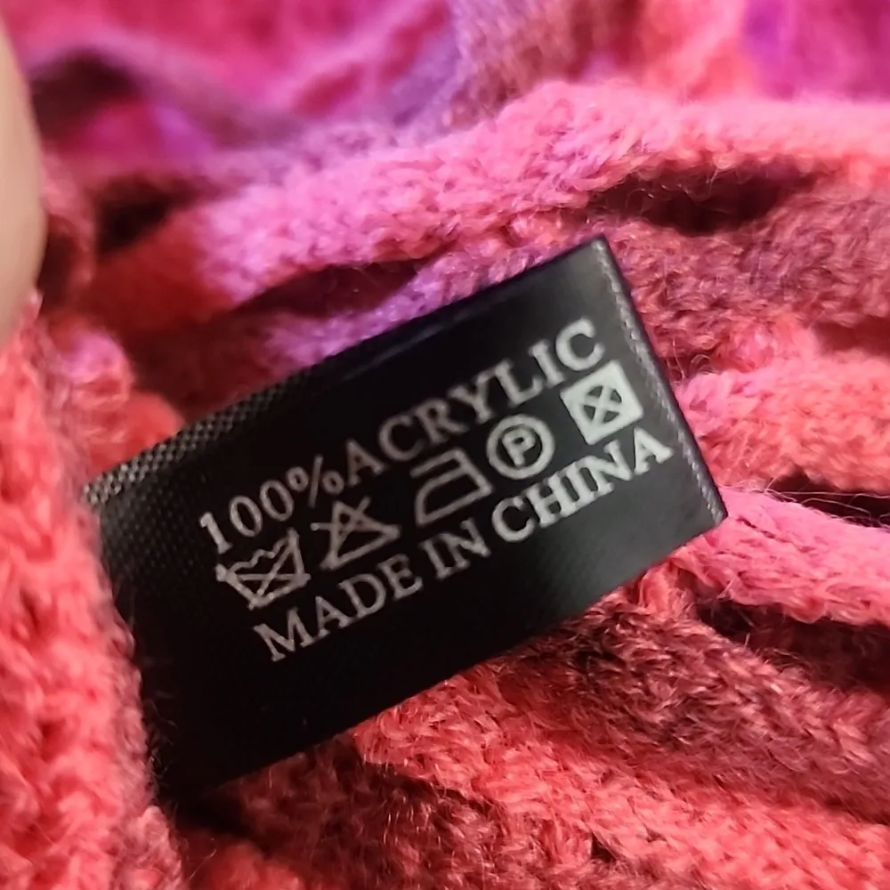 Coral Fringed Infinity Scarf with an Open Knit Design Pink - Image 6