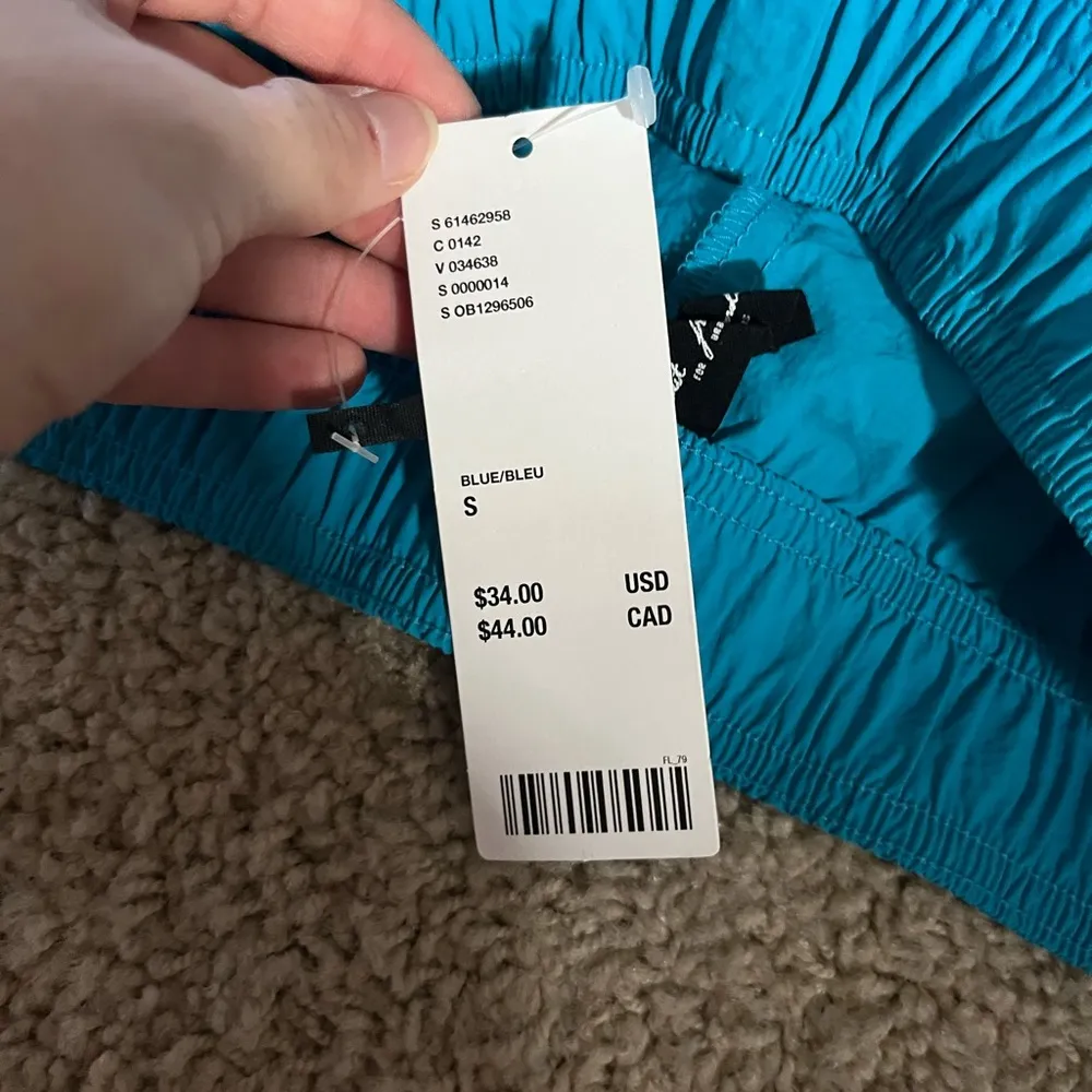 Out from underfed blue nylon shorts withh lime green hemming never worn - Image 6