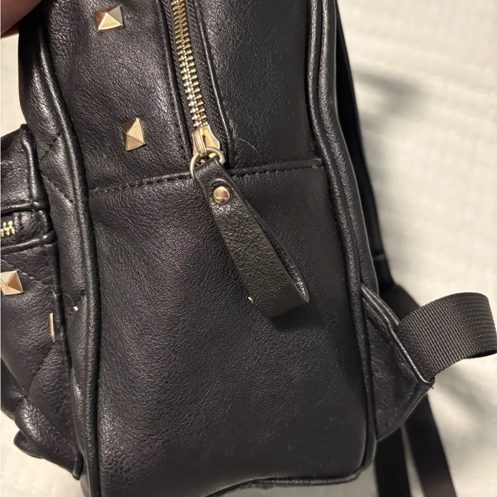 Icing Black Quilted Backpack with Gold Accents - Image 3