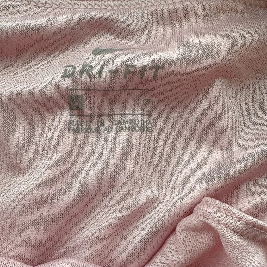 Nike womens 2-in-1 perforated
Eclipse running shorts pink Size small - Image 4