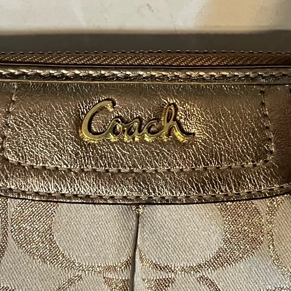COACH signature Charlie C zip around wallet gold with purple interior - Image 3