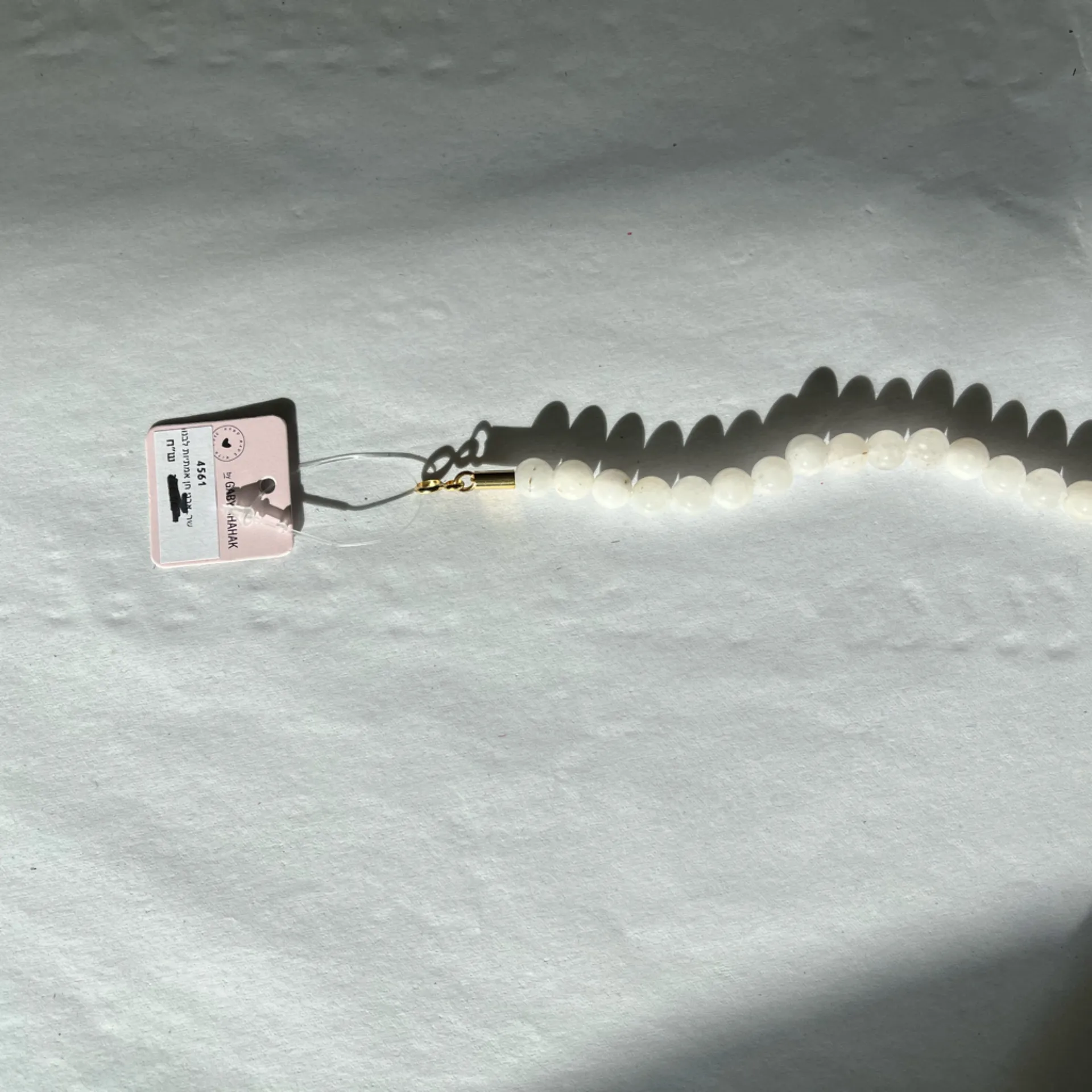 Gaby's White Beaded Necklace with Gold Fish Charm - Image 11