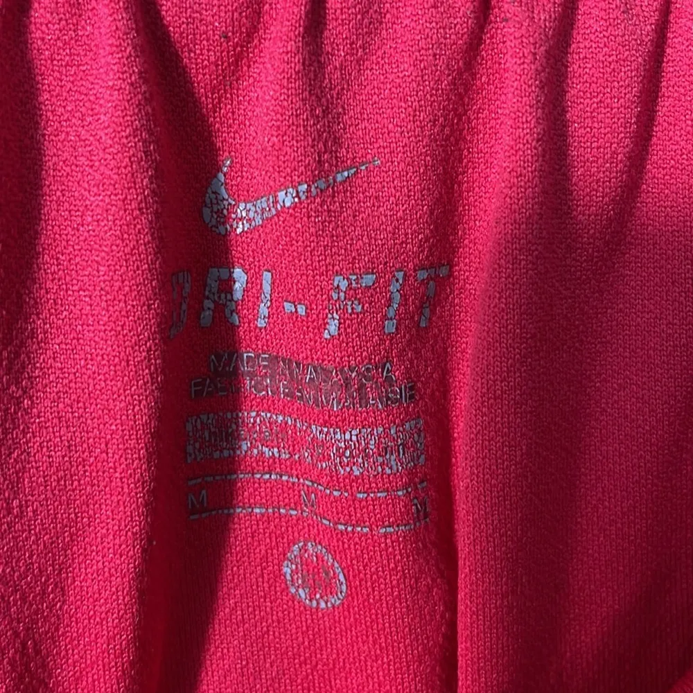 Nike dri-fit running shorts in size medium. Small spot as shown. - Image 4