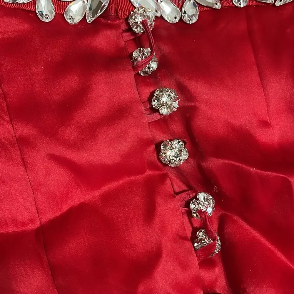Elegant Red Strapless Gown with Embellishments - Image 11