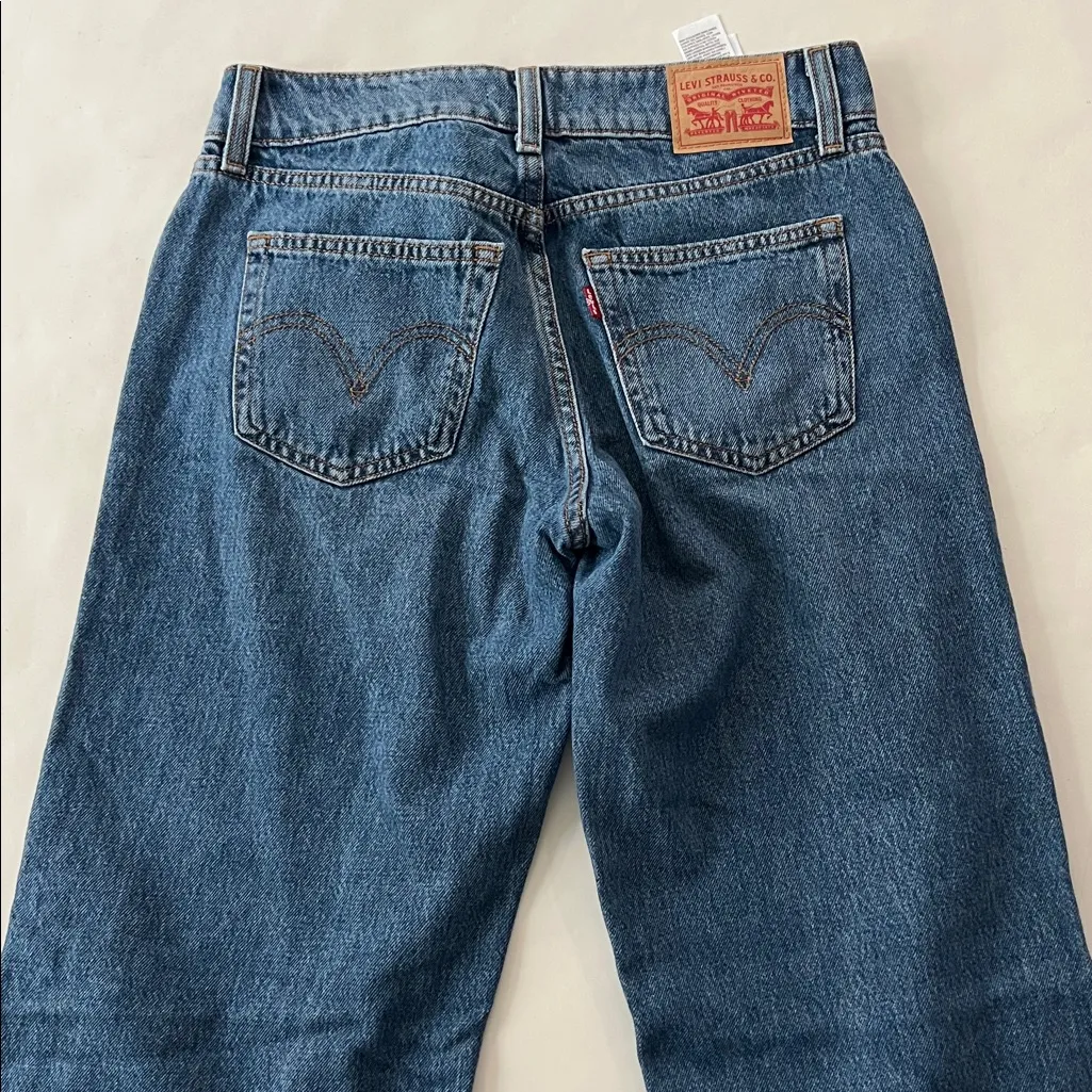 Levi's  SUPERLOW Double Button Jeans 32" Medium Wash Size 27 - Image 6