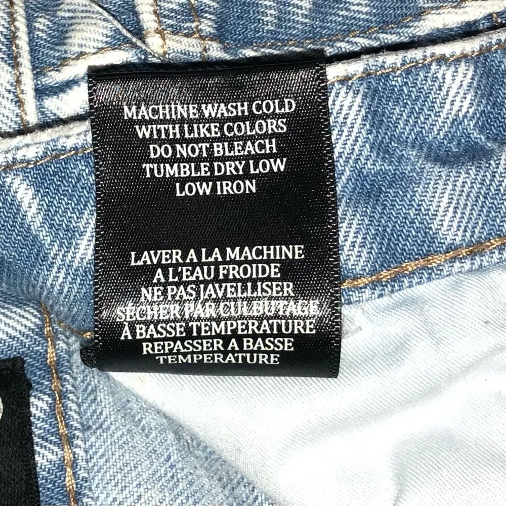 The Reeve Ultra High-Rise Frayed Raw Hem Light Wash Denim Shorts - Image 9