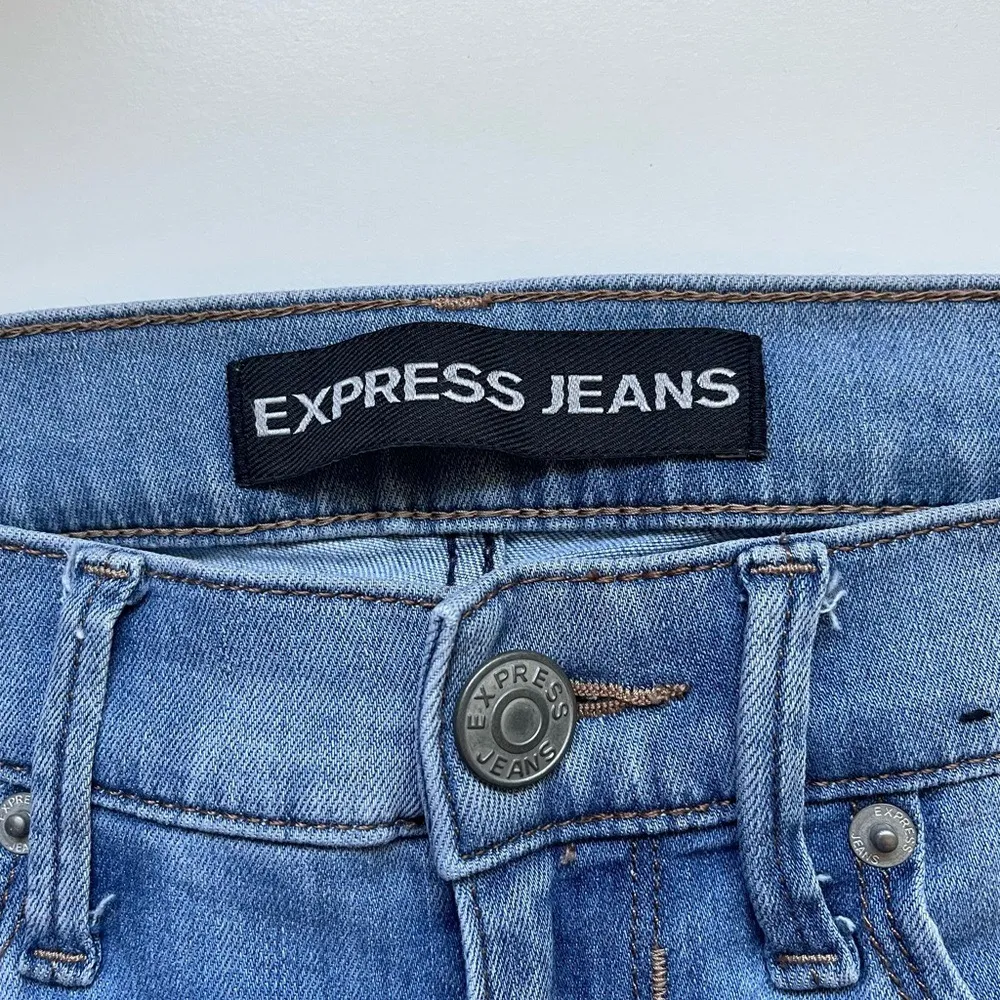 Performance Stretch Light Wash Mid-rise Destructed Skinny Jeans - Image 10