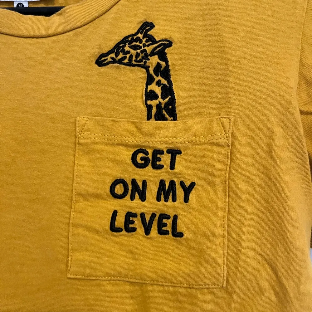 Marshall’s mustard yellow T shirt. - Image 2