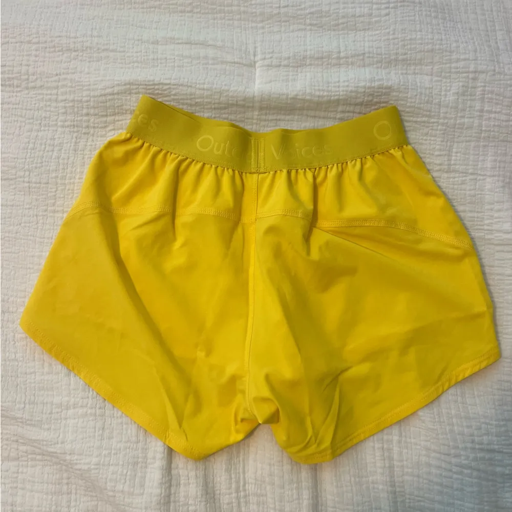 Outdoor voices yellow relay 3” relay shorts - Image 2
