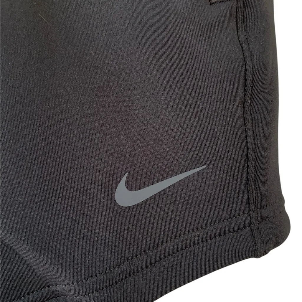 Nike women's Dri-FIT training shorts in black W/ Side zip Pockets - Image 3