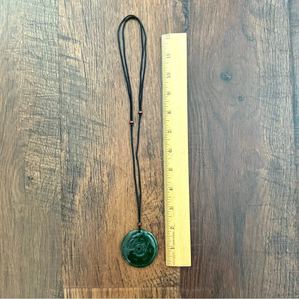 Carved jadeite pendant necklace on adjustable cord. - Image 7