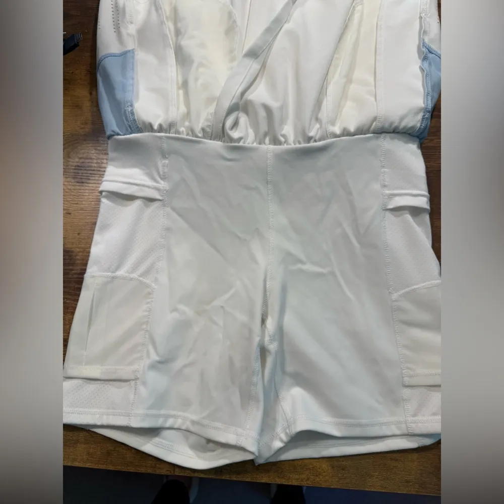 White and Blue Athletic Skorts with Asymmetrical Design Size XS - Image 6