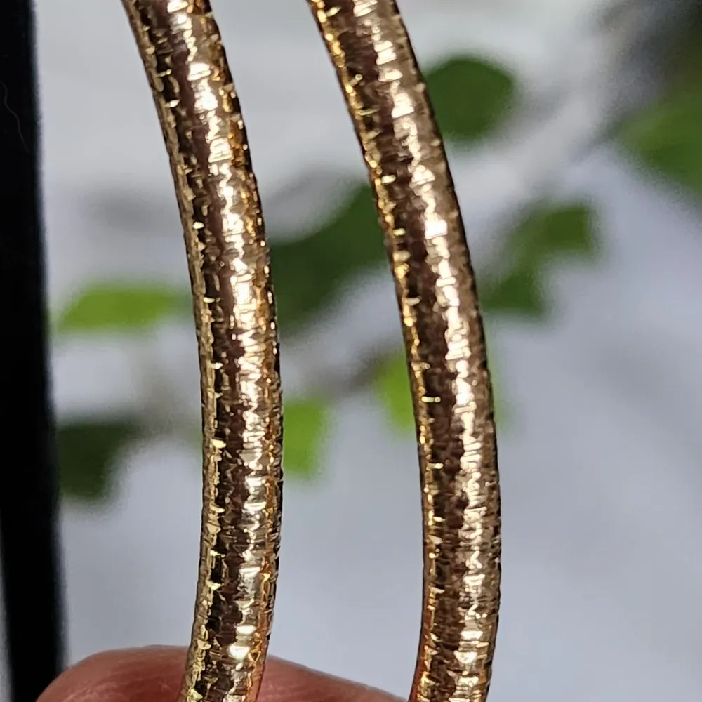Large Gold Teardrop Hoop Earrings - Image 5